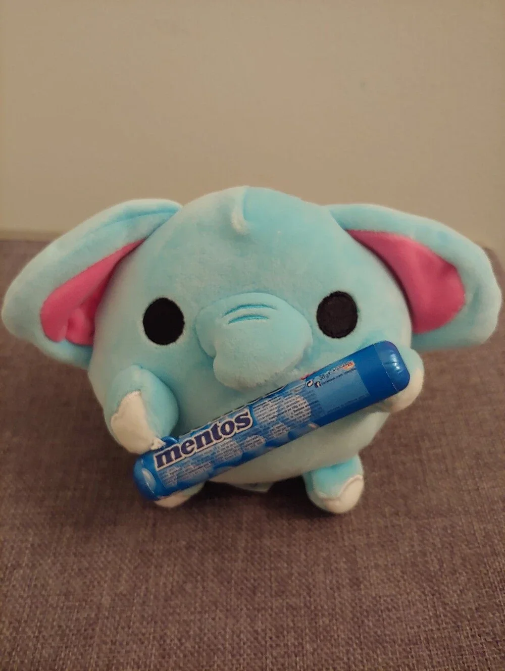 Blue Plush Elephant Holding Mentos Candy